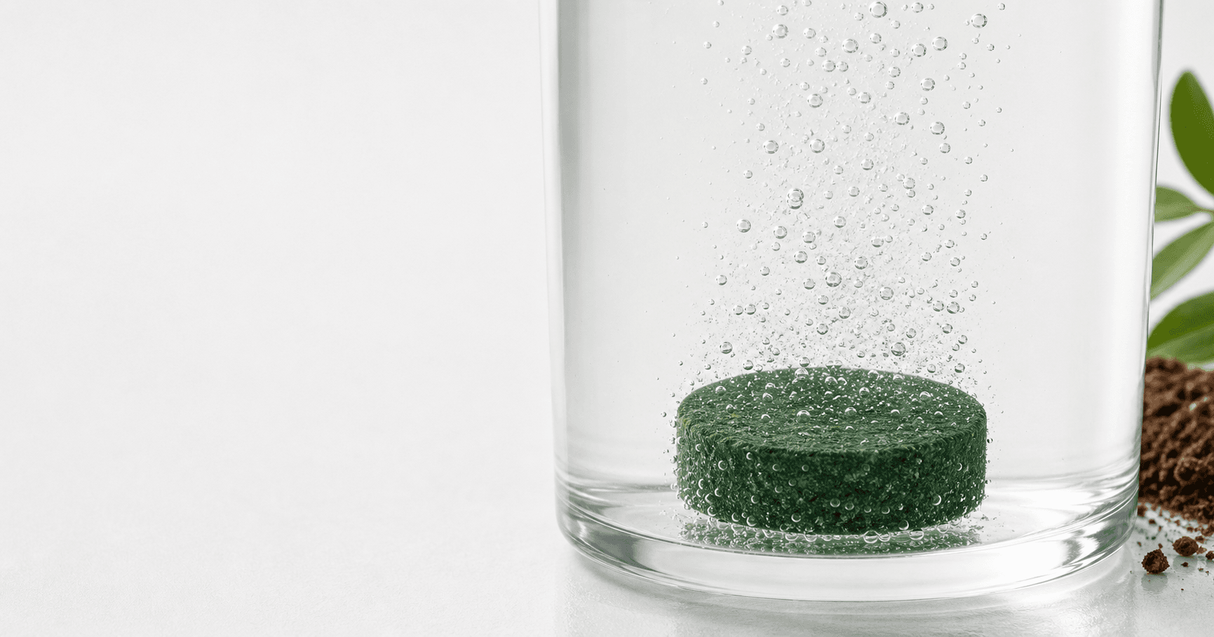 SEPTIFIX green effervescent tablet dissolving in water